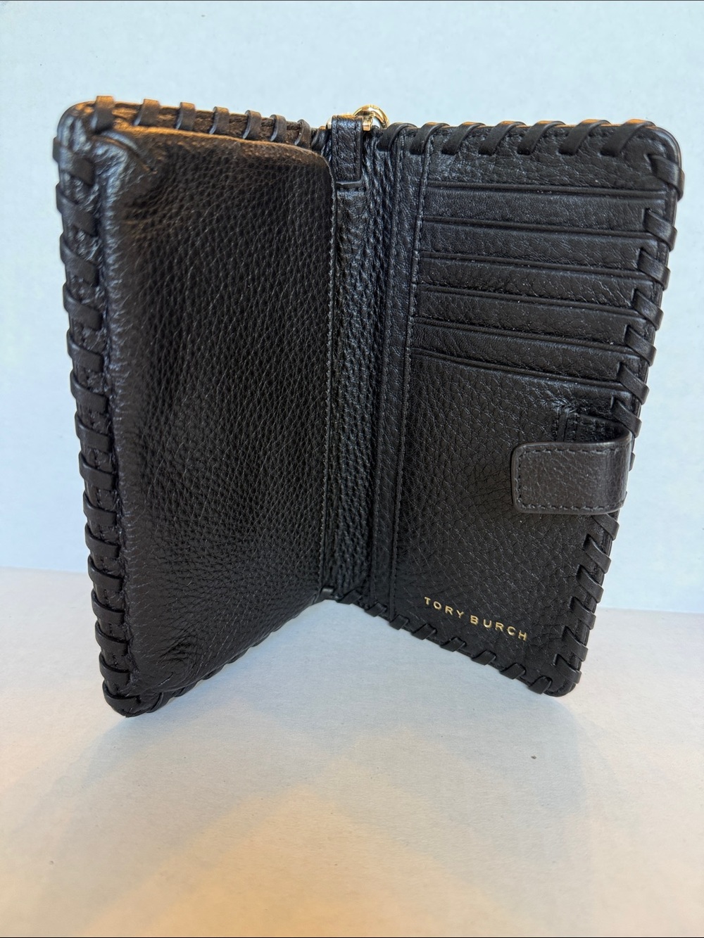 Tory Burch Black Pebbled Leather Wristlet with Logo Medallion - Picture 6 of 10